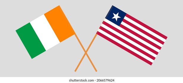 Crossed flags of Republic of Ivory Coast and Liberia. Official colors. Correct proportion