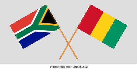 Crossed flags of Republic of South Africa and Guinea. Official colors. Correct proportion