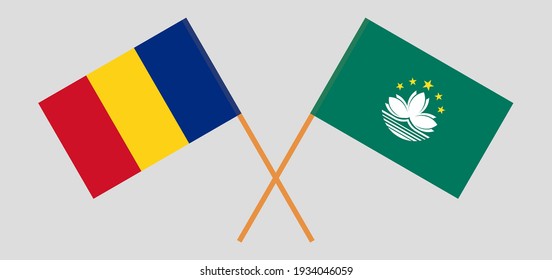 Crossed flags of Romania and Macau. Official colors. Correct proportion