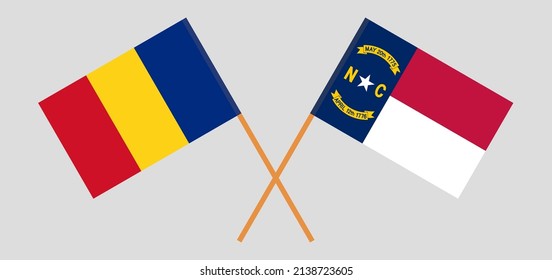 Crossed flags of Romania and The State of North Carolina. Official colors. Correct proportion. Vector illustration
