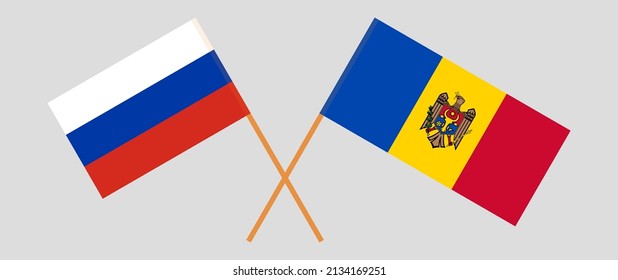 Crossed flags of Russia and Moldova. Official colors. Correct proportion. Vector illustration
