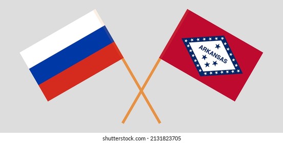 Crossed flags of Russia and The State of Arkansas. Official colors. Correct proportion. Vector illustration