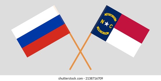 Crossed flags of Russia and The State of North Carolina. Official colors. Correct proportion. Vector illustration
