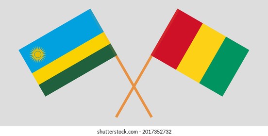 Crossed flags of Rwanda and Guinea. Official colors. Correct proportion