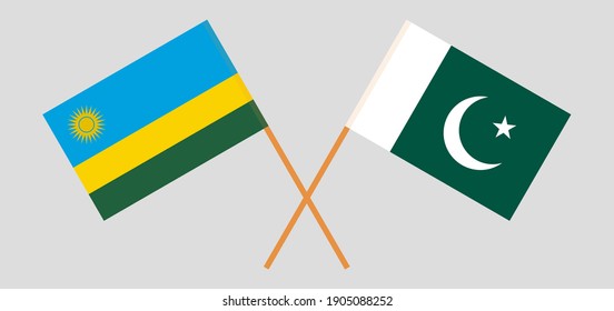 Crossed flags of Rwanda and Pakistan