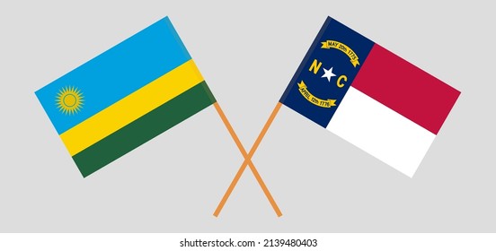 Crossed flags of Rwanda and The State of North Carolina. Official colors. Correct proportion. Vector illustration
