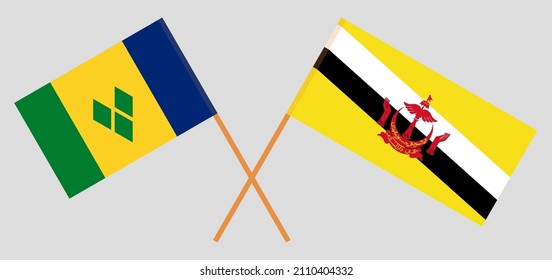 Crossed flags of Saint Vincent and the Grenadines and Brunei. Official colors. Correct proportion. Vector illustration
