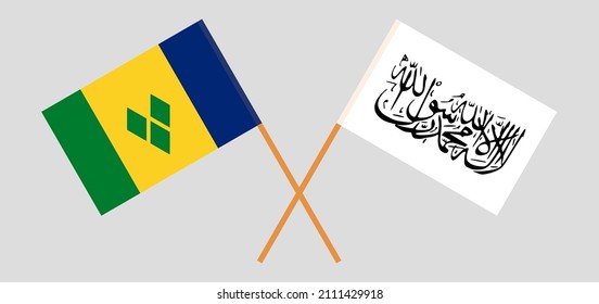 Crossed flags of Saint Vincent and the Grenadines and Taliban. Official colors. Correct proportion. Vector illustration
