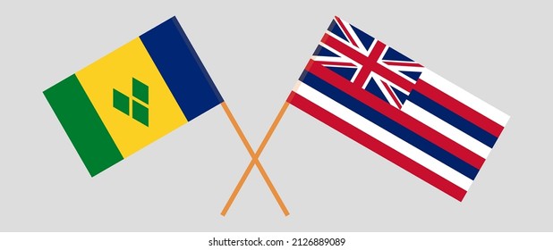 Crossed flags of Saint Vincent and the Grenadines and The State Of Hawaii. Official colors. Correct proportion. Vector illustration
