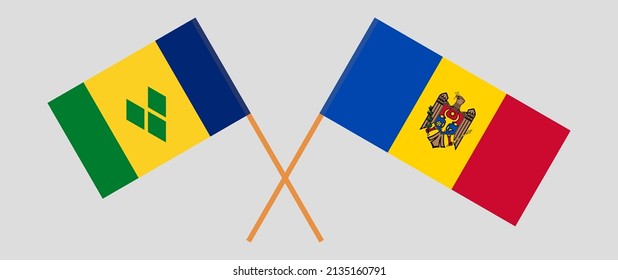 Crossed flags of Saint Vincent and the Grenadines and Moldova. Official colors. Correct proportion. Vector illustration
