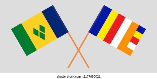 Crossed flags of Saint Vincent and the Grenadines and Buddhism. Official colors. Correct proportion. Vector illustration
