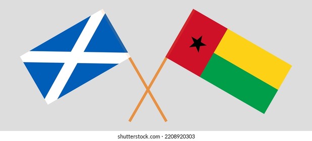 Crossed flags of Scotland and Guinea-Bissau. Official colors. Correct proportion. Vector illustration

