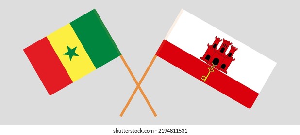Gekreuzte Flaggen von Senegal und Gibraltar. Offizielle Farben. Richtiger Anteil. Vektorgrafik
