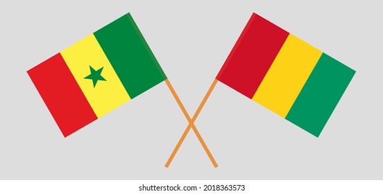 Crossed flags of Senegal and Guinea. Official colors. Correct proportion