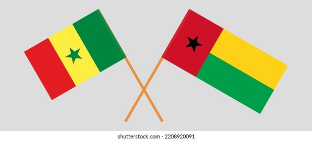 Crossed flags of Senegal and Guinea-Bissau. Official colors. Correct proportion. Vector illustration
