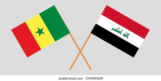 Crossed flags of Senegal and Iraq