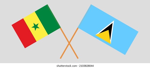 Crossed flags of Senegal and Saint Lucia. Official colors. Correct proportion. Vector illustration
