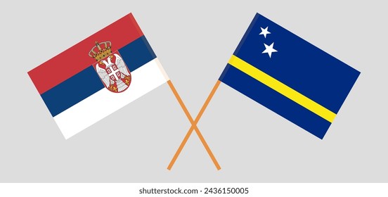 Crossed flags of Serbia and Country of Curacao. Official colors. Correct proportion. Vector illustration
