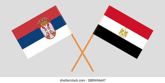 Crossed flags of Serbia and Egypt