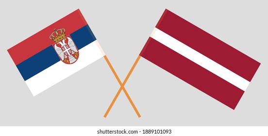 Crossed flags of Serbia and Latvia