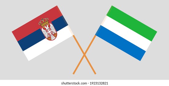 Crossed flags of Serbia and Sierra Leone. Official colors. Correct proportion