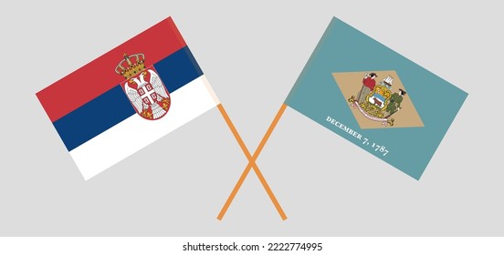 Crossed flags of Serbia and The State of Delaware. Official colors. Correct proportion. Vector illustration
