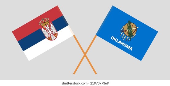 Crossed flags of Serbia and The State of Oklahoma. Official colors. Correct proportion. Vector illustration
