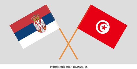 Crossed flags of Serbia and Tunisia