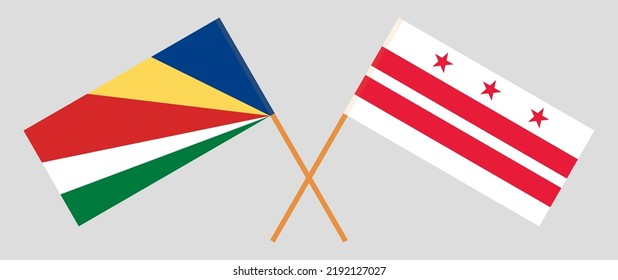 Crossed flags of Seychelles and the District of Columbia. Official colors. Correct proportion. Vector illustration
