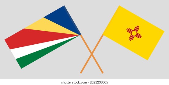 Crossed flags of Seychelles and the State of New Mexico. Official colors. Correct proportion