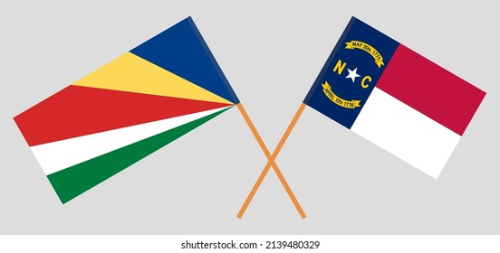 Crossed flags of Seychelles and The State of North Carolina. Official colors. Correct proportion. Vector illustration
