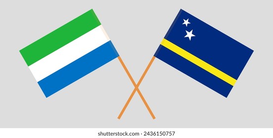 Crossed flags of Sierra Leone and Country of Curacao. Official colors. Correct proportion. Vector illustration
