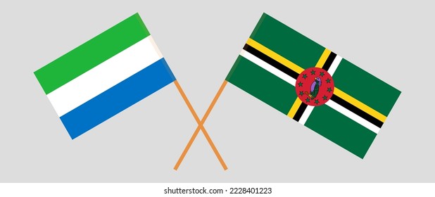 Crossed flags of Sierra Leone and Dominica. Official colors. Correct proportion. Vector illustration
