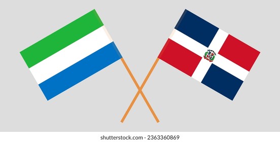 Crossed flags of Sierra Leone and Dominican Republic. Official colors. Correct proportion. Vector illustration
