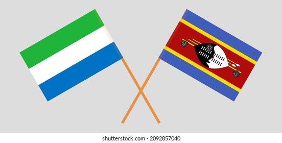 Crossed flags of Sierra Leone and Eswatini. Official colors. Correct proportion. Vector illustration
