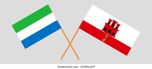Crossed flags of Sierra Leone and Gibraltar. Official colors. Correct proportion. Vector illustration
