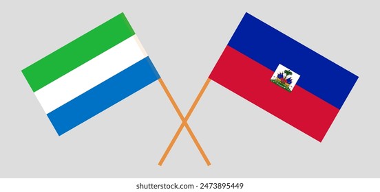 Crossed flags of Sierra Leone and Haiti. Official colors. Correct proportion. Vector illustration
