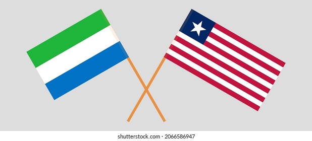 Crossed flags of Sierra Leone and Liberia. Official colors. Correct proportion