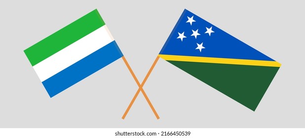 Crossed flags of Sierra Leone and Solomon Islands. Official colors. Correct proportion. Vector illustration
