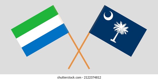 Überquerte Flaggen von Sierra Leone und dem Staat South Carolina. Offizielle Farben. Richtiger Anteil. Vektorgrafik
