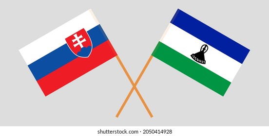 Crossed flags of Slovakia and the Kingdom of Lesotho. Official colors. Correct proportion