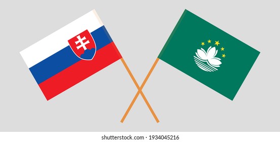 Crossed flags of Slovakia and Macau. Official colors. Correct proportion