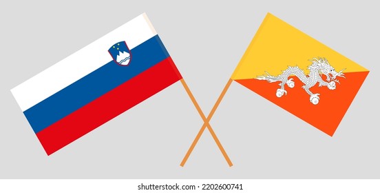 Crossed flags of Slovenia and Bhutan. Official colors. Correct proportion. Vector illustration
