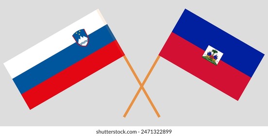 Crossed flags of Slovenia and Haiti. Official colors. Correct proportion. Vector illustration
