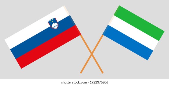 Crossed flags of Slovenia and Sierra Leone. Official colors. Correct proportion