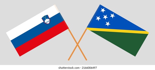Crossed flags of Slovenia and Solomon Islands. Official colors. Correct proportion. Vector illustration
