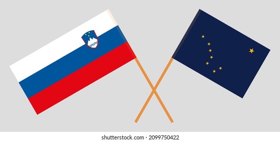 Crossed flags of Slovenia and the State of Alaska. Official colors. Correct proportion. Vector illustration
