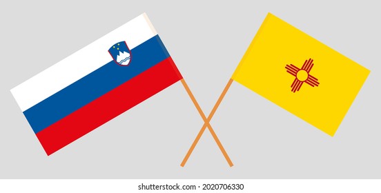 Crossed flags of Slovenia and the State of New Mexico. Official colors. Correct proportion