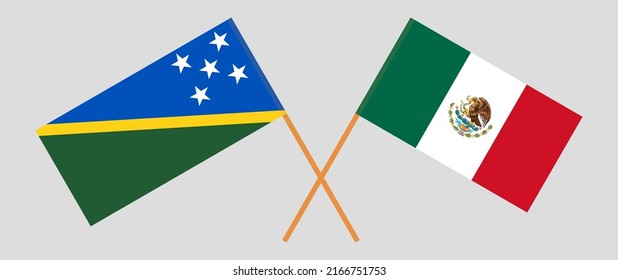 Crossed flags of Solomon Islands and Mexico. Official colors. Correct proportion. Vector illustration
