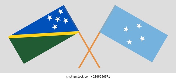 Crossed flags of Solomon Islands and Micronesia. Official colors. Correct proportion. Vector illustration
